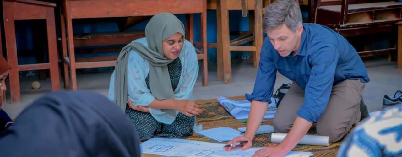 Design Solutions for a Humanitarian Crisis: Tanner Patrick collaborating with resident of Digaale, Somaliland